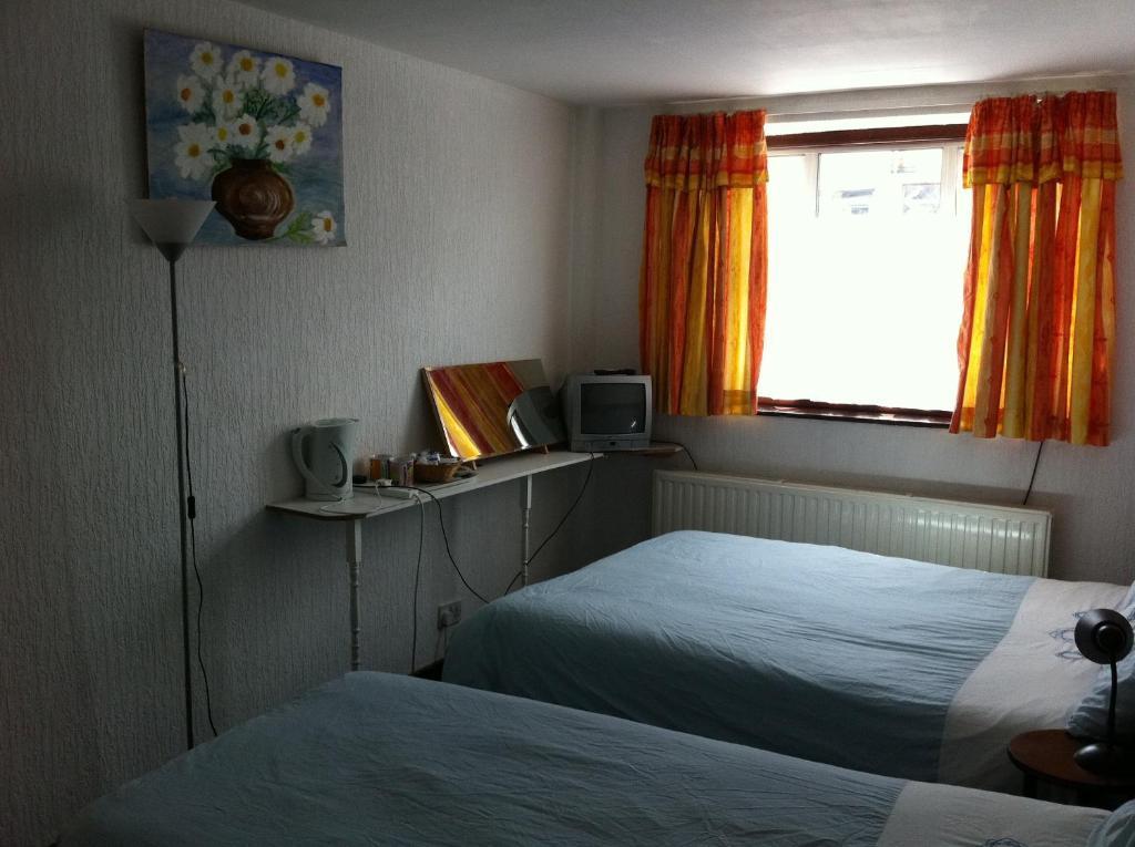 Wanstead Hotel Londra Oda fotoğraf